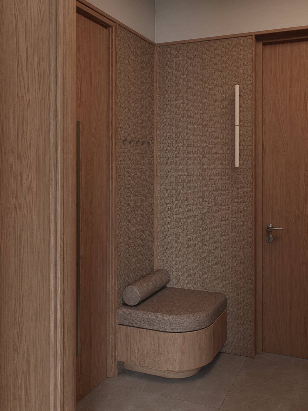Built-in entrance bench in fabric and timber, with wall hooks and a slim wall light beside the door.