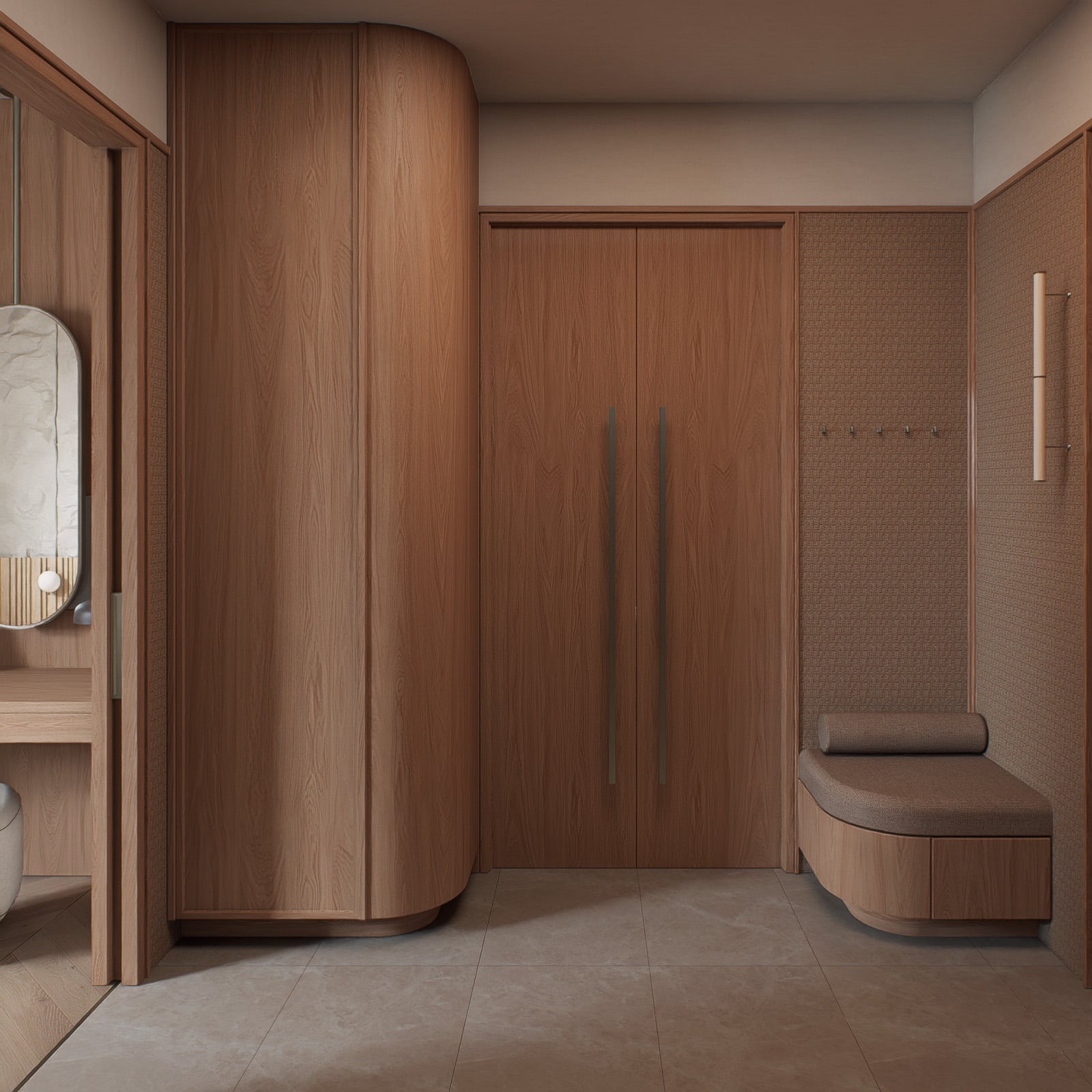 Wardrobe wall with curved oak, full-height storage, next to the low entrance seating.